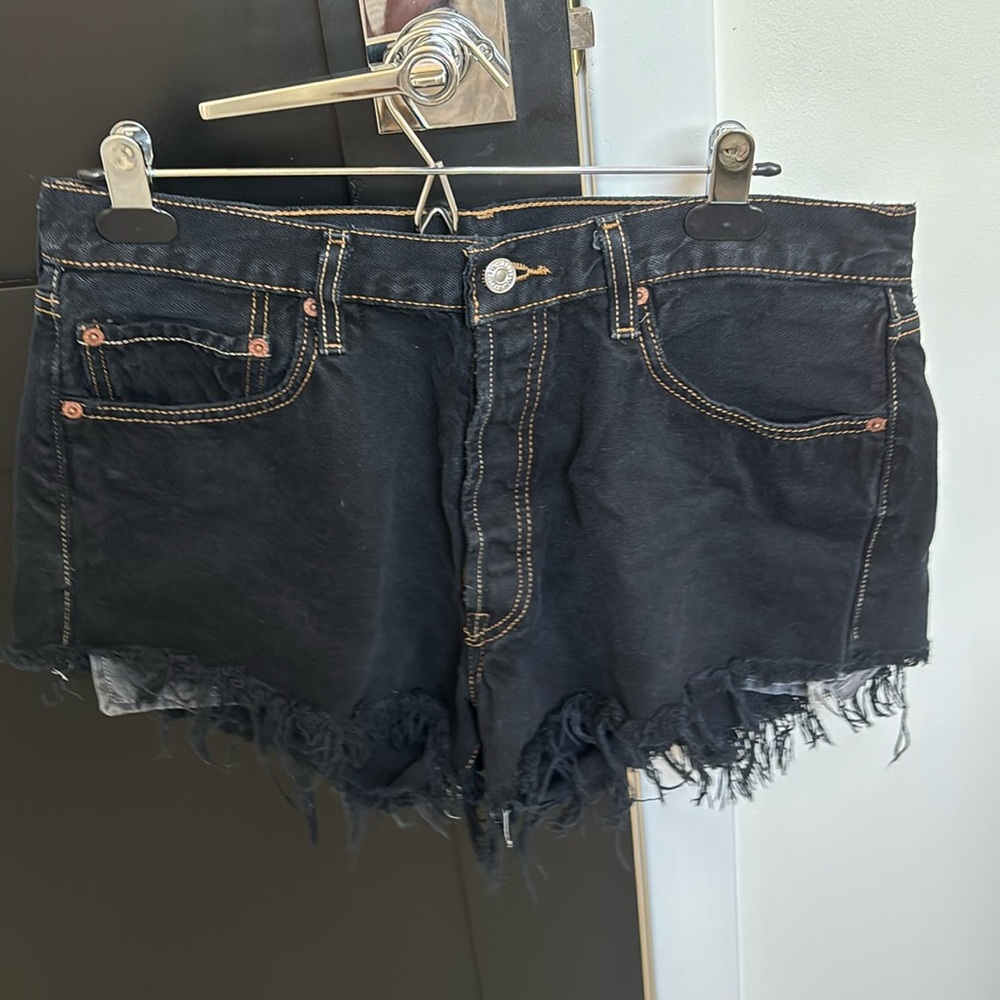 Levi’s Distressed Black Denim Shorts